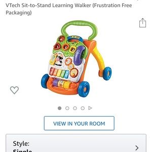 V-tech sit to stand learning walker.